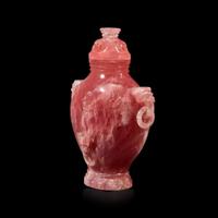 A Chinese carved rose quartz archaistic vase and cover