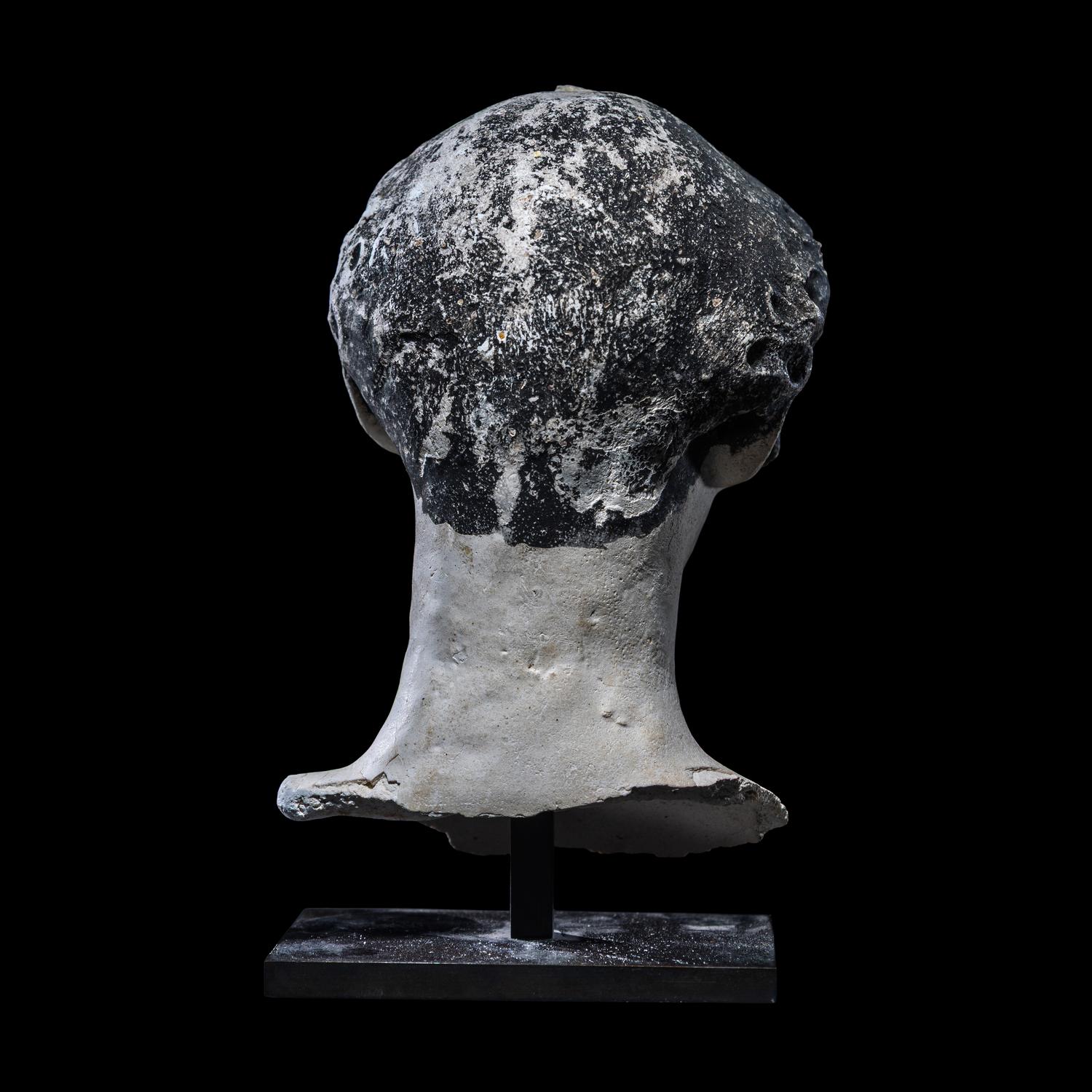 An Egyptian Painted Stucco Mummy Mask