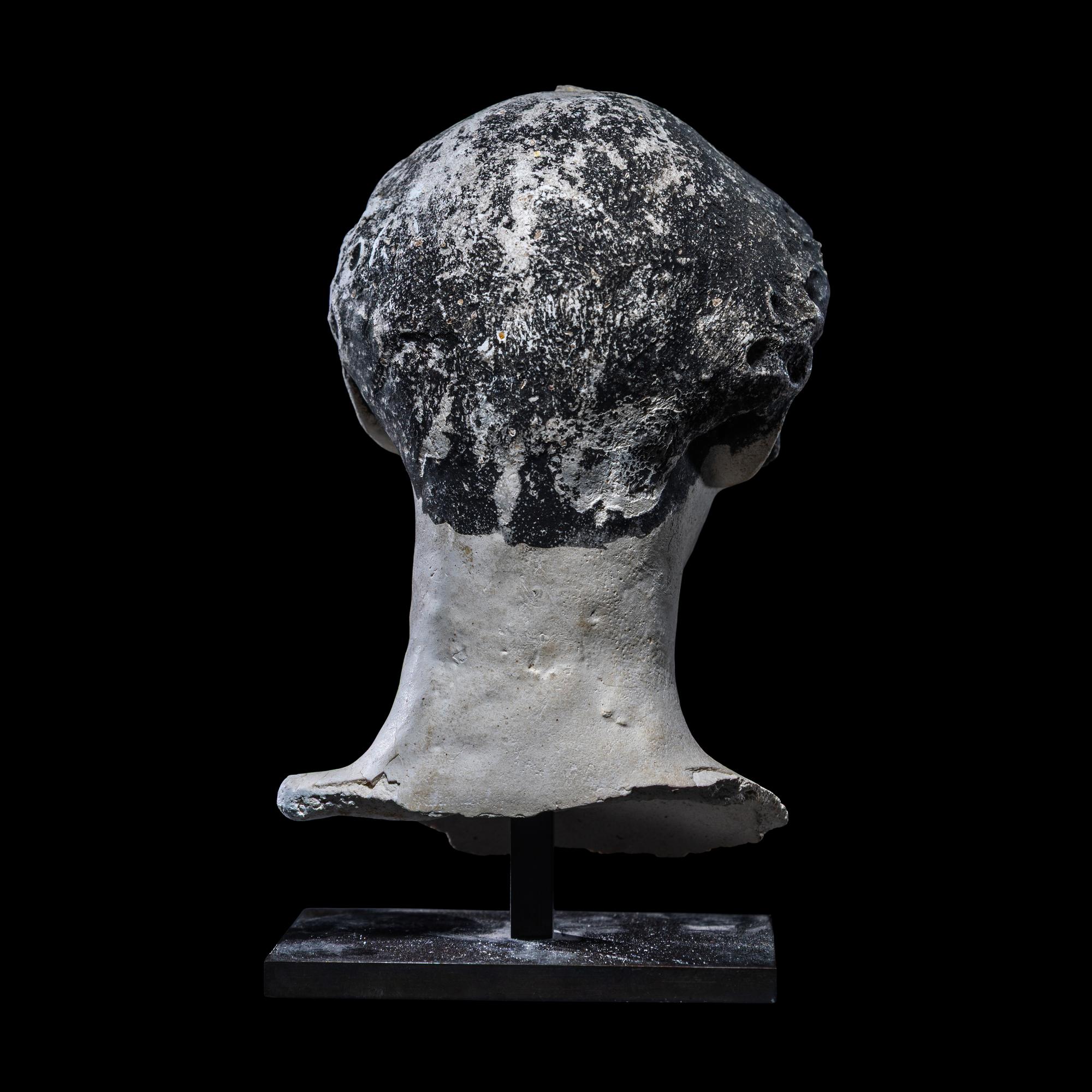 An Egyptian Painted Stucco Mummy Mask