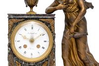An Empire Style Gilt Metal and Marble Figural Mantel Clock