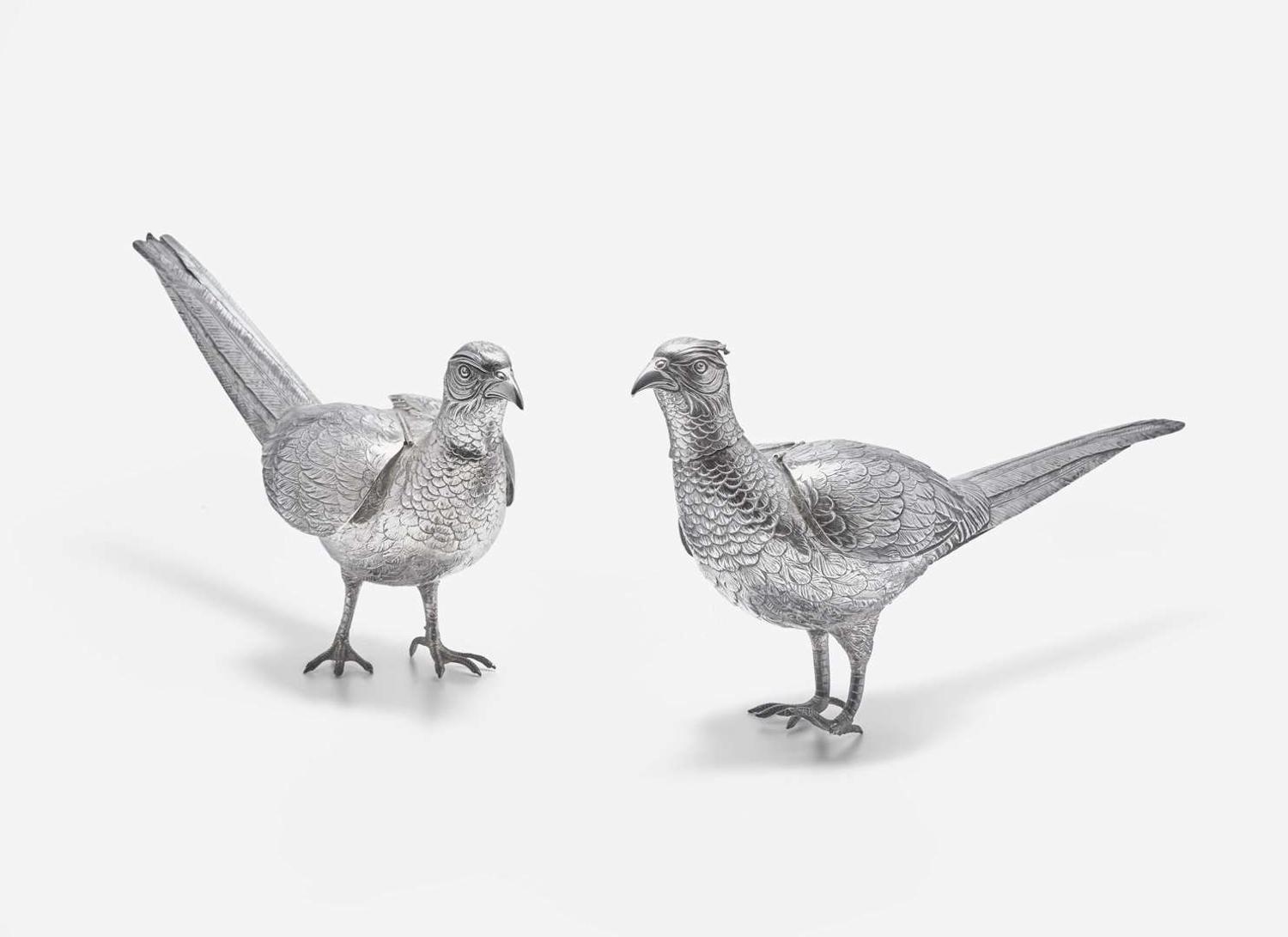 A pair of .800 silver pheasant-form decanters, Vereinigte Silberwarenfabrik, Hanau, Germany, early 20th century