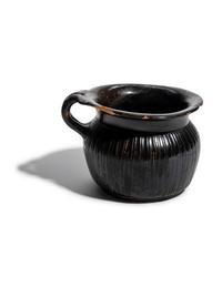 A Greek Black-Glazed Ribbed Mug