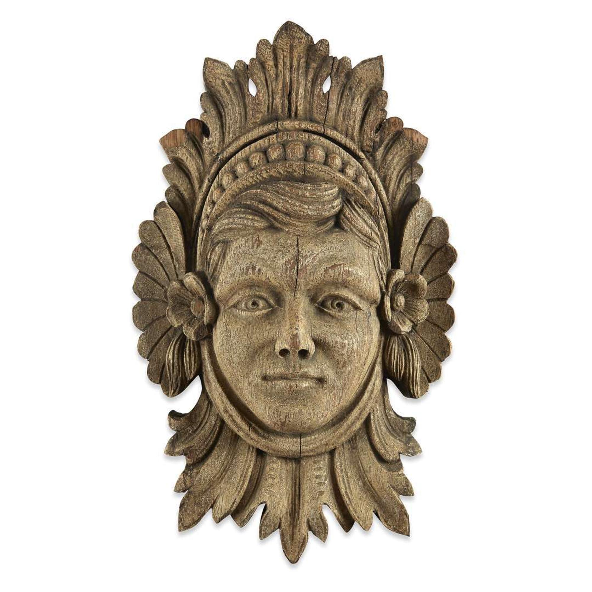 Carved oak wall mask of a female late 19th/early 20th century