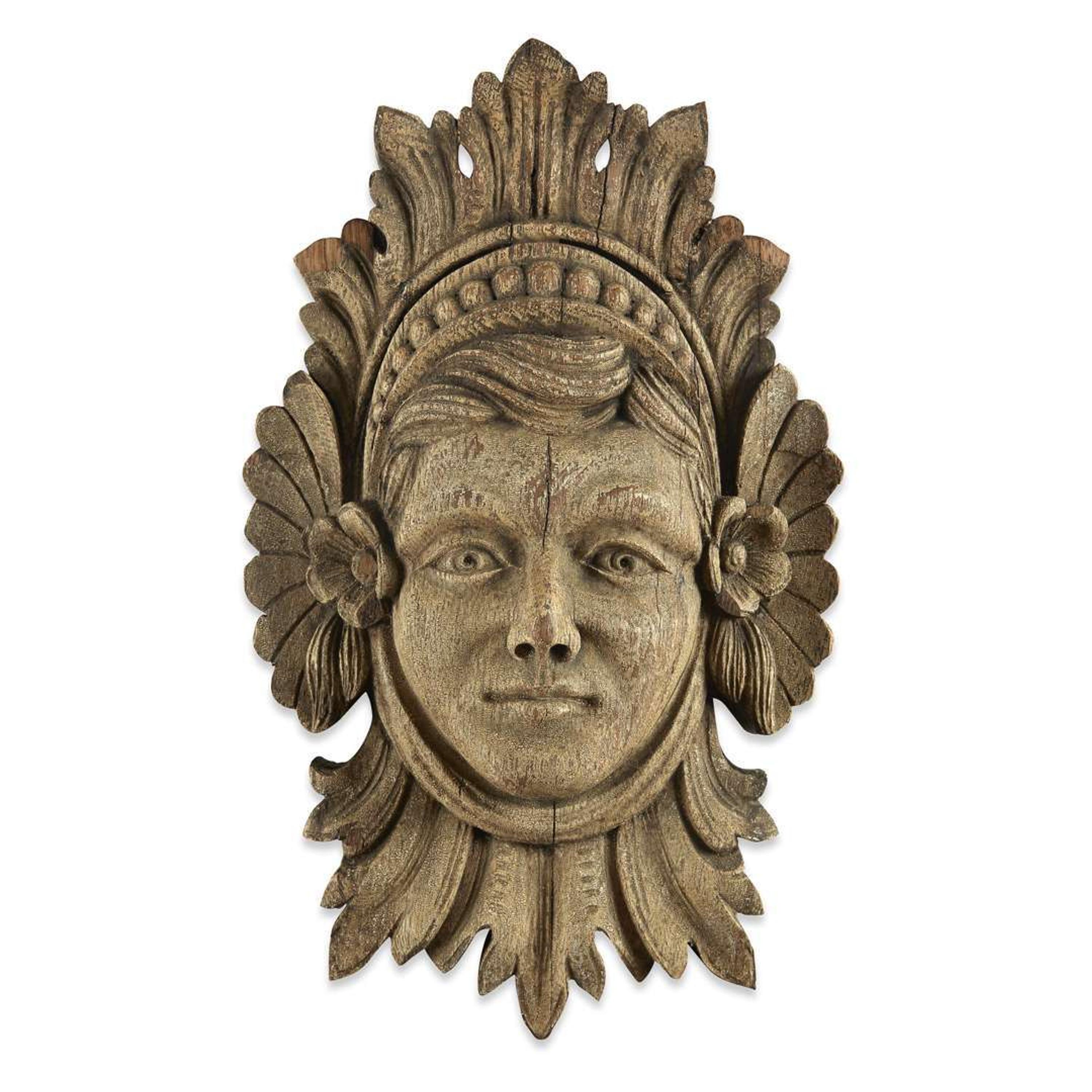 Carved oak wall mask of a female late 19th/early 20th century