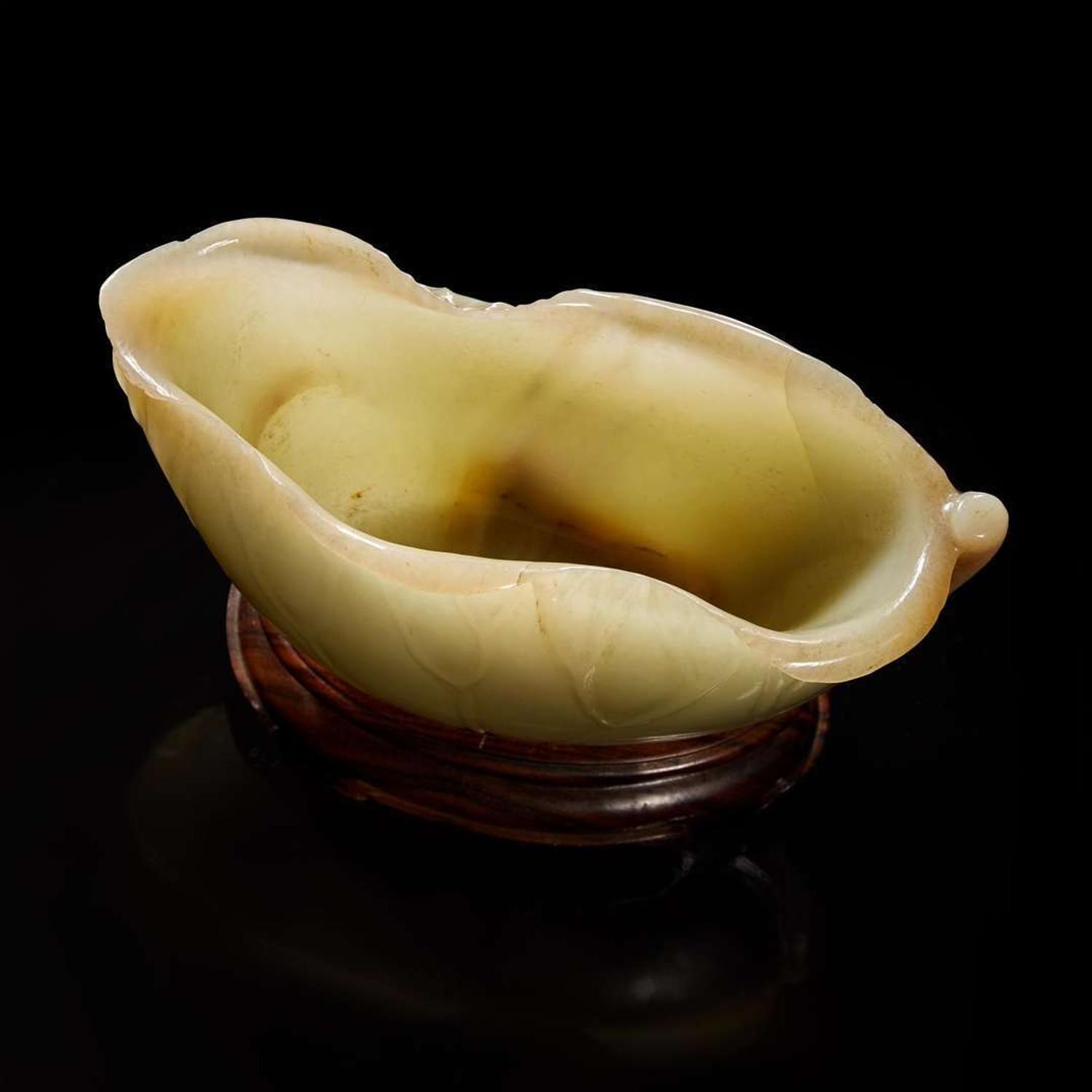 A Chinese carved celadon jade "Lotus" coupe 蓮葉玉杯