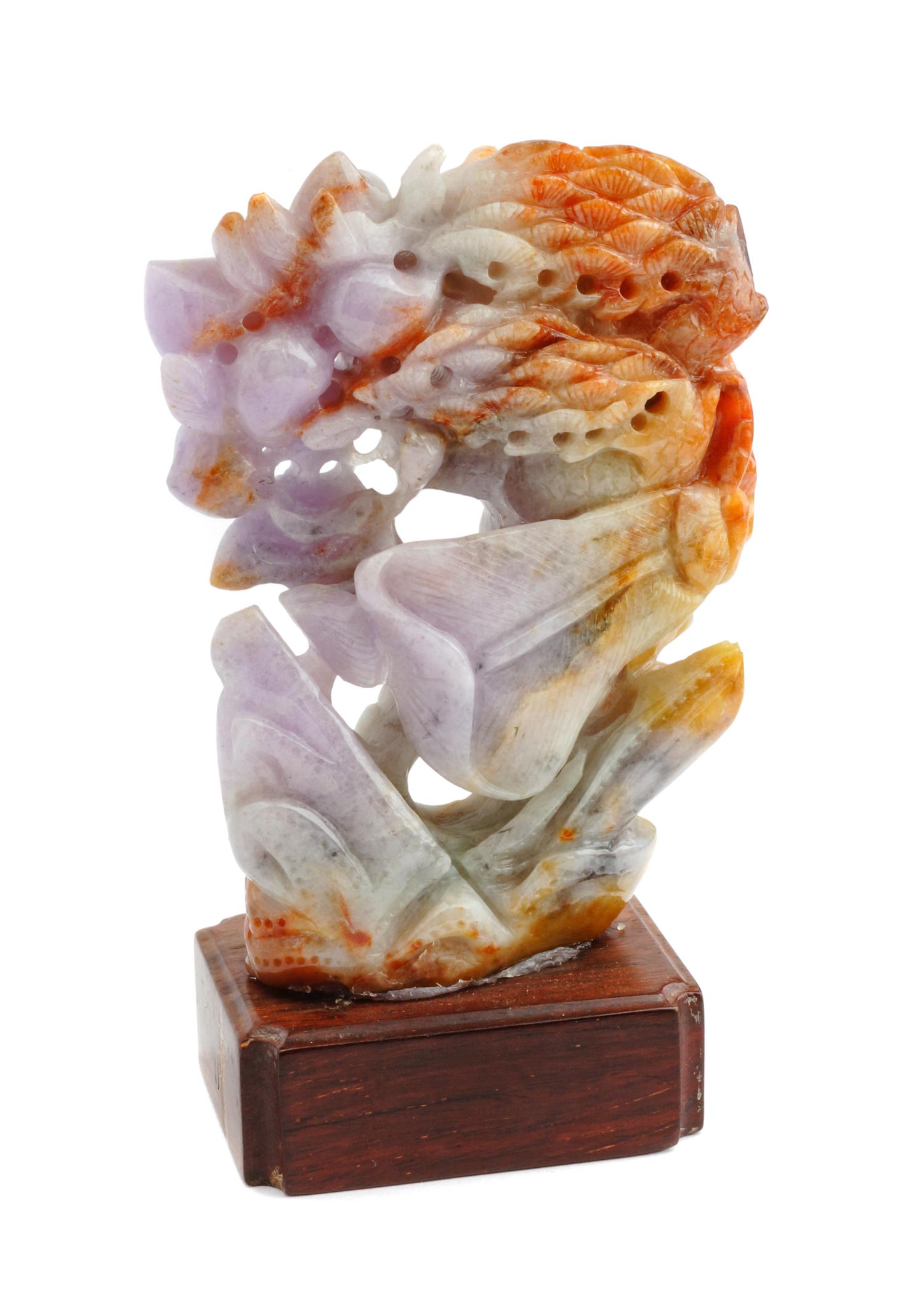 A Chinese Lavender Jade Carving Height 5 inches.