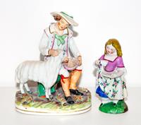 A Staffordshire Porcelain Figure of a Seated Shepherd and a Figure of a Girl