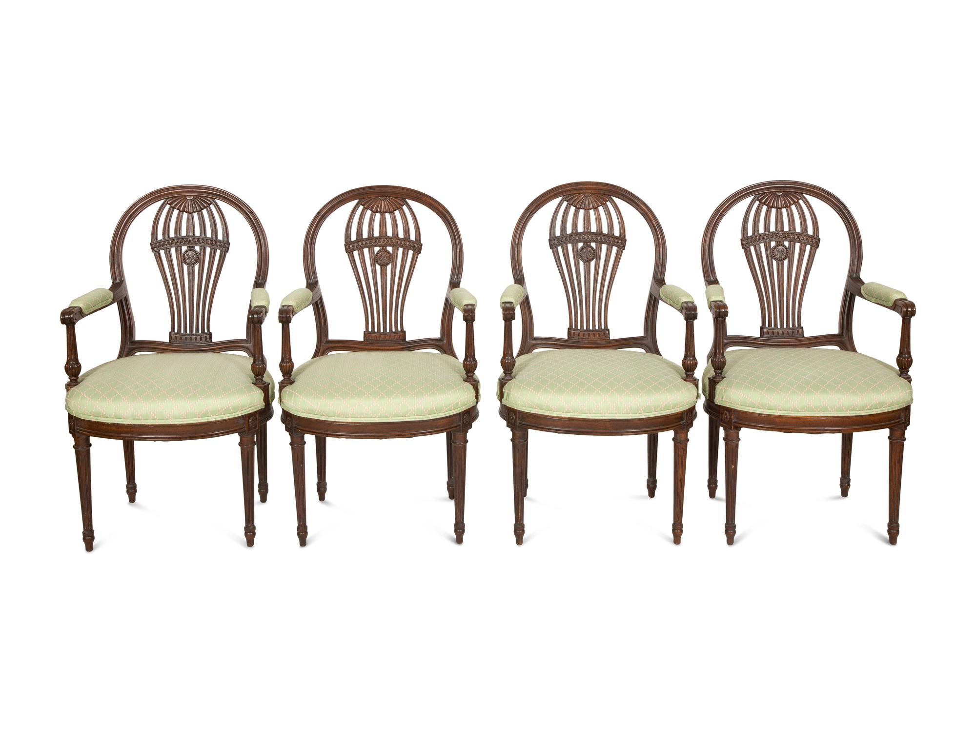 A Set of Four Louis XVI Style Mahogany "Montgolfière" Armchairs