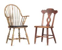 A Carved and Yellow-Painted Wood Leather Upholstered Brace Back Continuous Windsor Armchair