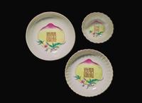 A Chinese ruby-back porcelain "Wan Shou Wu Jiang" "Peach" tea bowl and two saucers, Possibly 18th century 萬壽無疆茶杯及兩小碟 或十八世紀