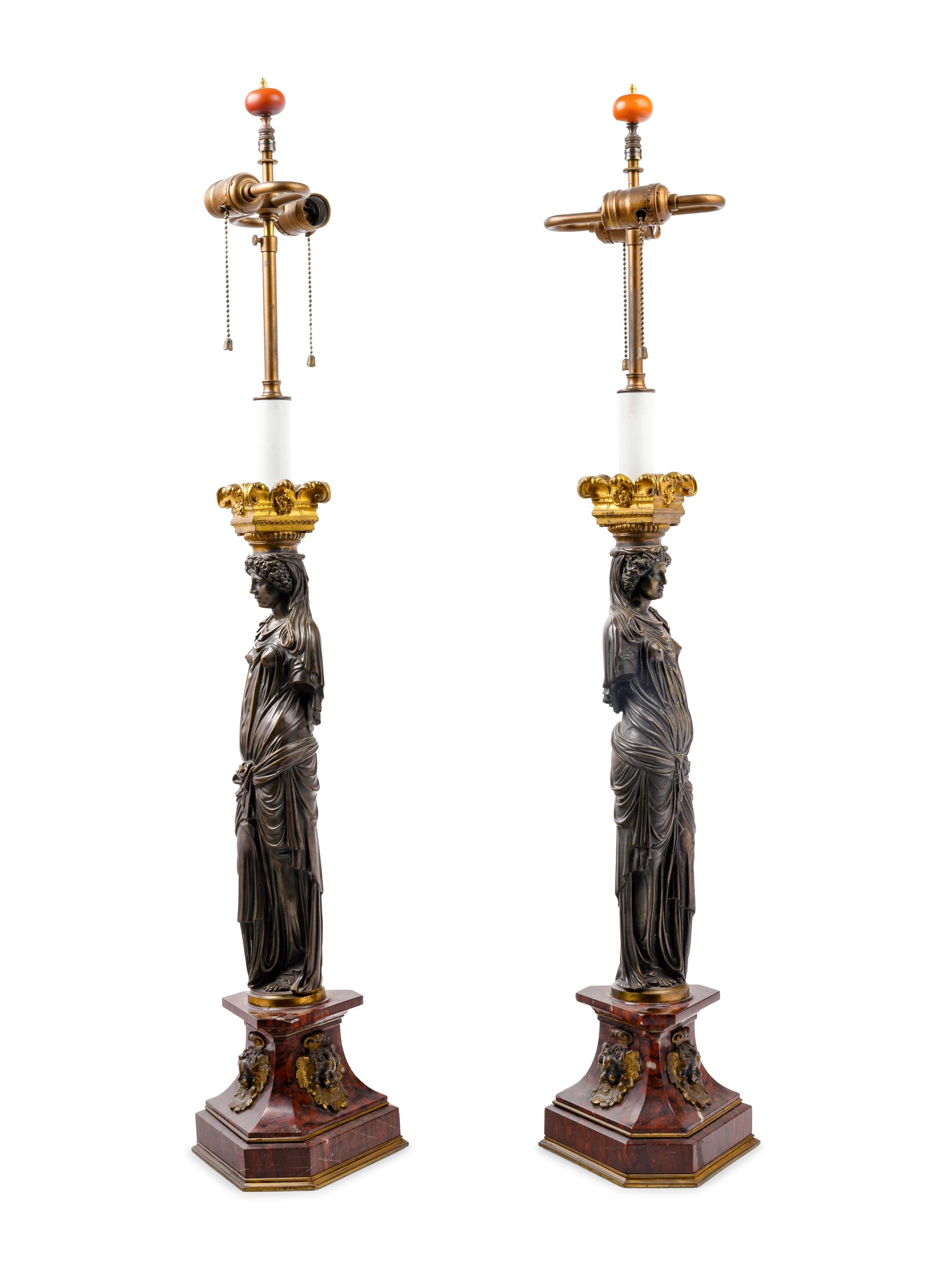 A Pair of French Neoclassical Gilt and Patinated Bronze Figural Lamps After Jean Goujon
