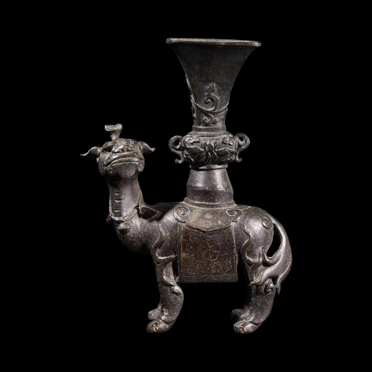 A Chinese Patinated Bronze Mythical Beast Vase, Ming Dynasty 明 銅瑞獸香著瓶