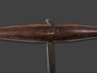 A Group of Early Cast Iron and Wood Farm and Carpentry Tools