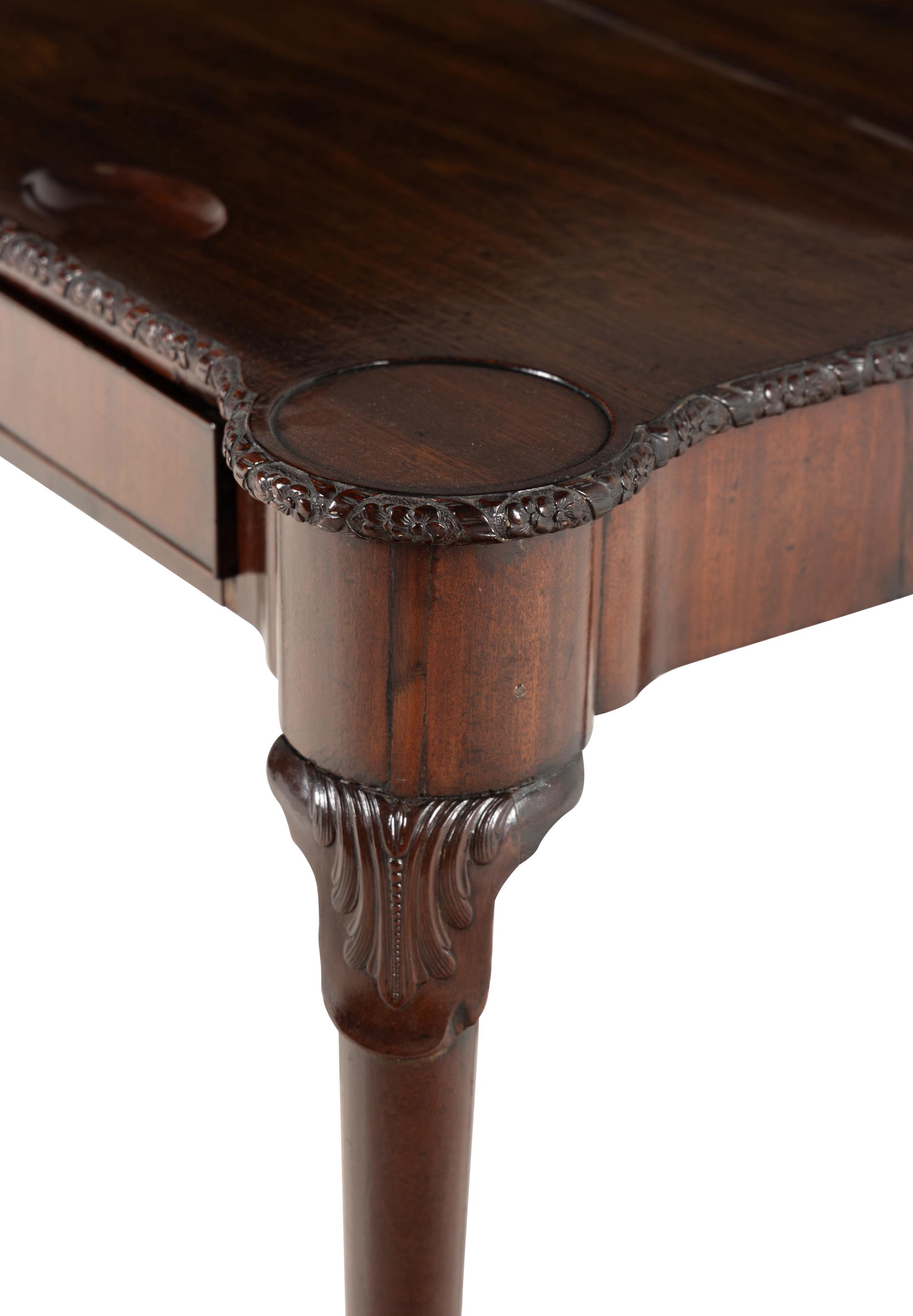 A George III Carved Mahogany Flip-Top Table