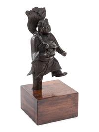 A Chinese Bronze Figure of a Boy Immortal