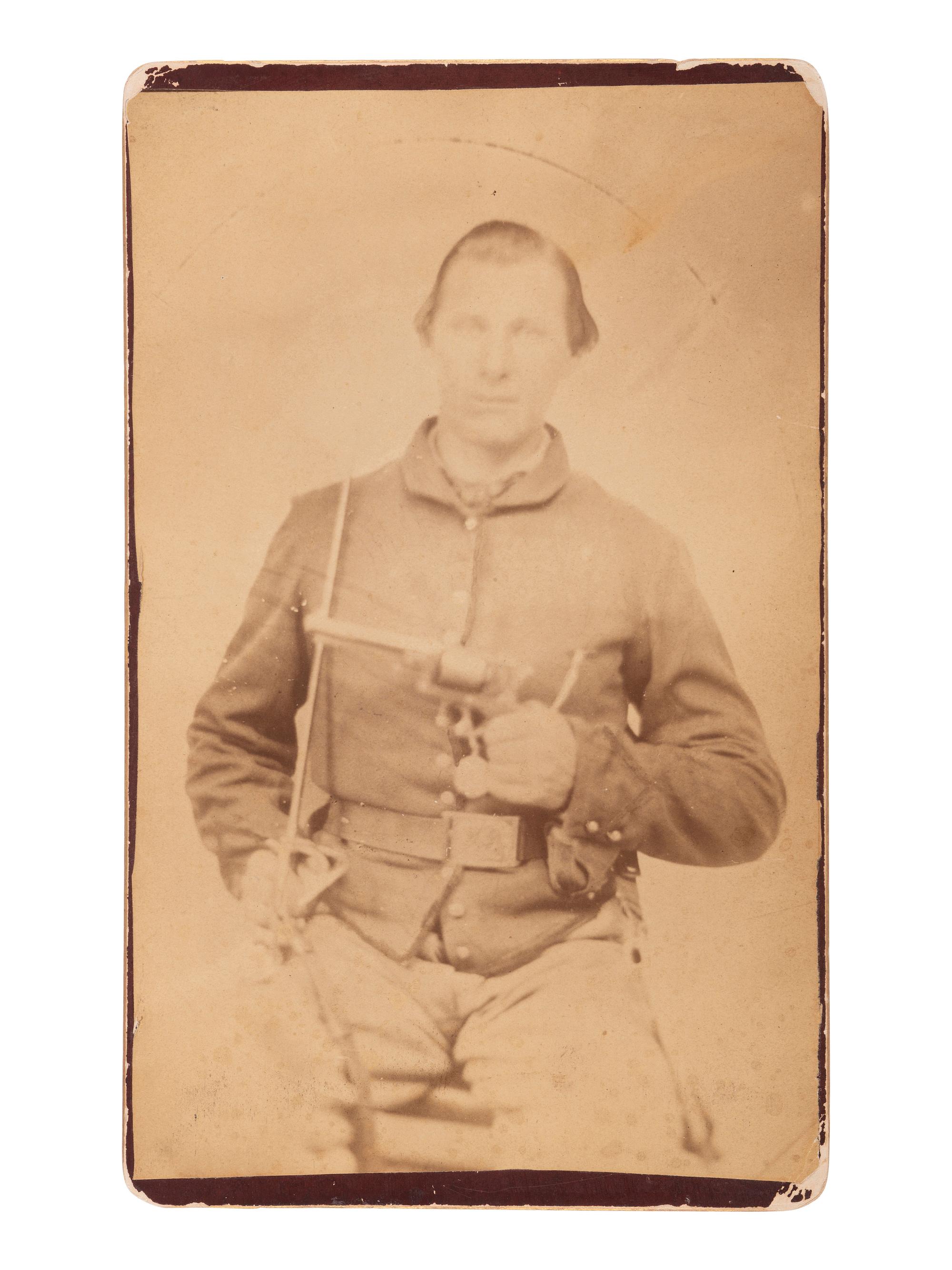 [CIVIL WAR] 9 CDVs of Civil War-era subjects with boudoir card enlargement of a doubly armed soldier