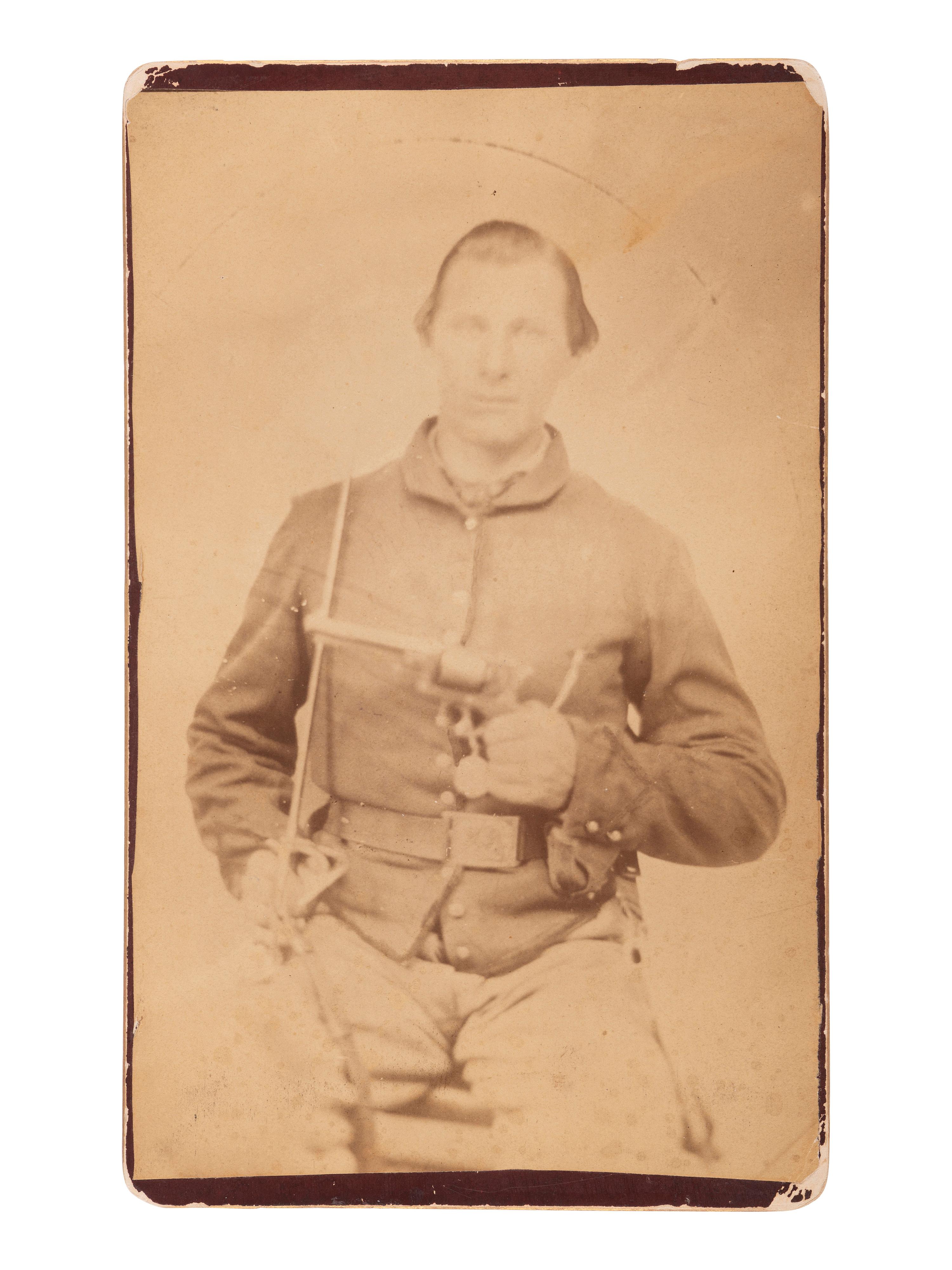 [CIVIL WAR] 9 CDVs of Civil War-era subjects with boudoir card enlargement of a doubly armed soldier