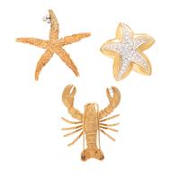 COLLECTION OF YELLOW GOLD SEASHORE BROOCHES