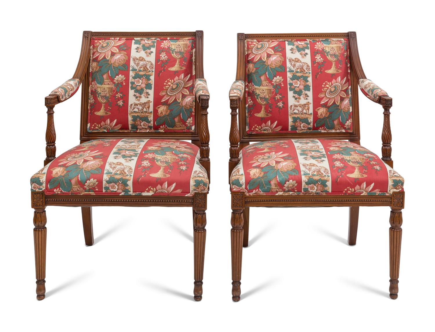 A Pair of Louis XVI Style Fauteuils with Striped Upholstery