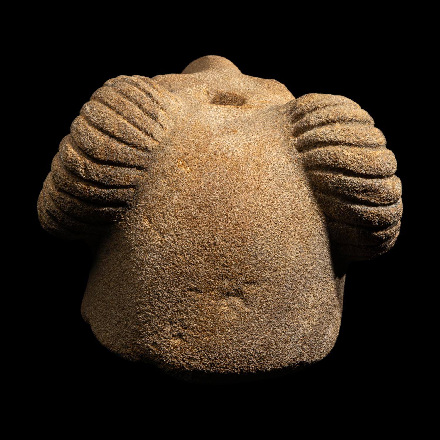 A Romano-Egyptian Style Sandstone Head of a Ram