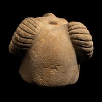 A Romano-Egyptian Style Sandstone Head of a Ram