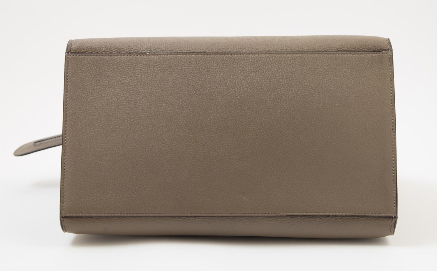 A Celine Taupe Leather and Suede Medium Trapeze Handbag, 11.5"- 20" L x 9" H x 7"- 9" W; Top handle: 4.5"; Strap drop: 15".