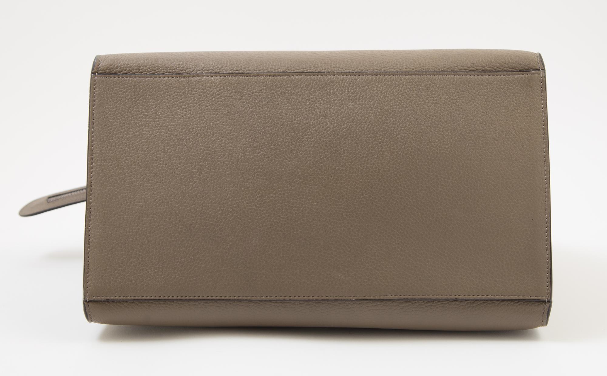 A Celine Taupe Leather and Suede Medium Trapeze Handbag, 11.5"- 20" L x 9" H x 7"- 9" W; Top handle: 4.5"; Strap drop: 15".