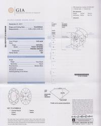 A 0.53 Carat Oval Cut Fancy Intense Pinkish Orange Diamond,