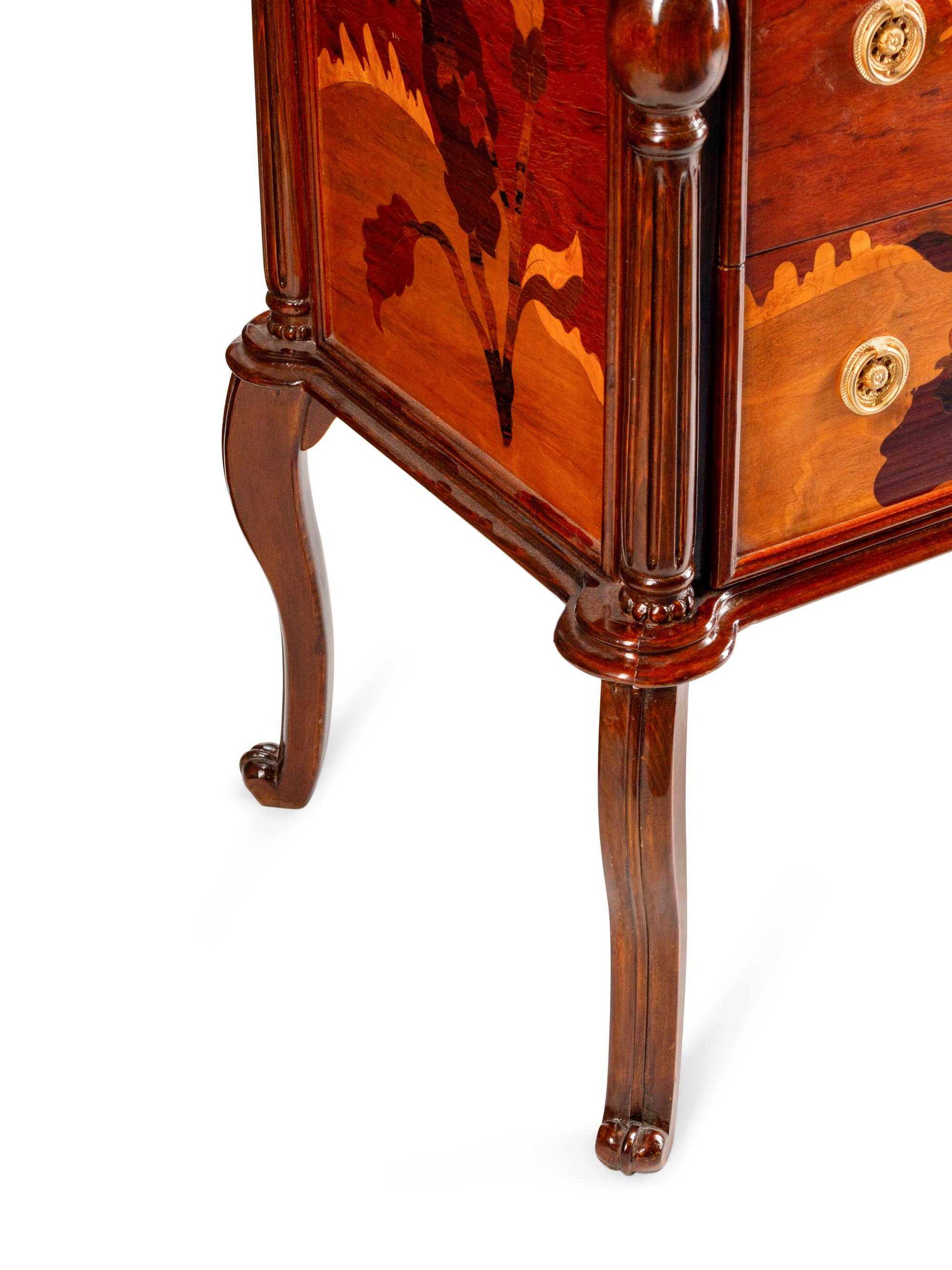 An Art Nouveau Style Inlaid Chest of Drawers