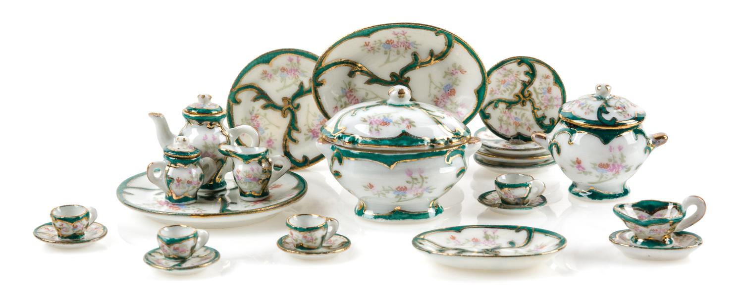 A Porcelain Dinner Service Diameter of charger 1 3/8 inches.