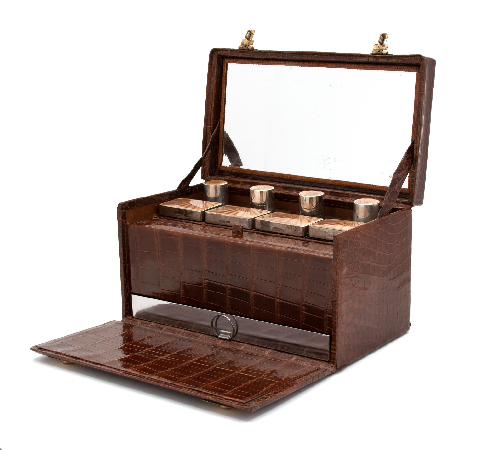 An English Crocodile Cased Silver and Enamel Dressing Case — ADIE BROTHERS LTD., BIRMINGHAM, 1936
