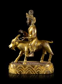 A Sino-Tibetan Gilt Bronze Figure of Garwa Nagpo