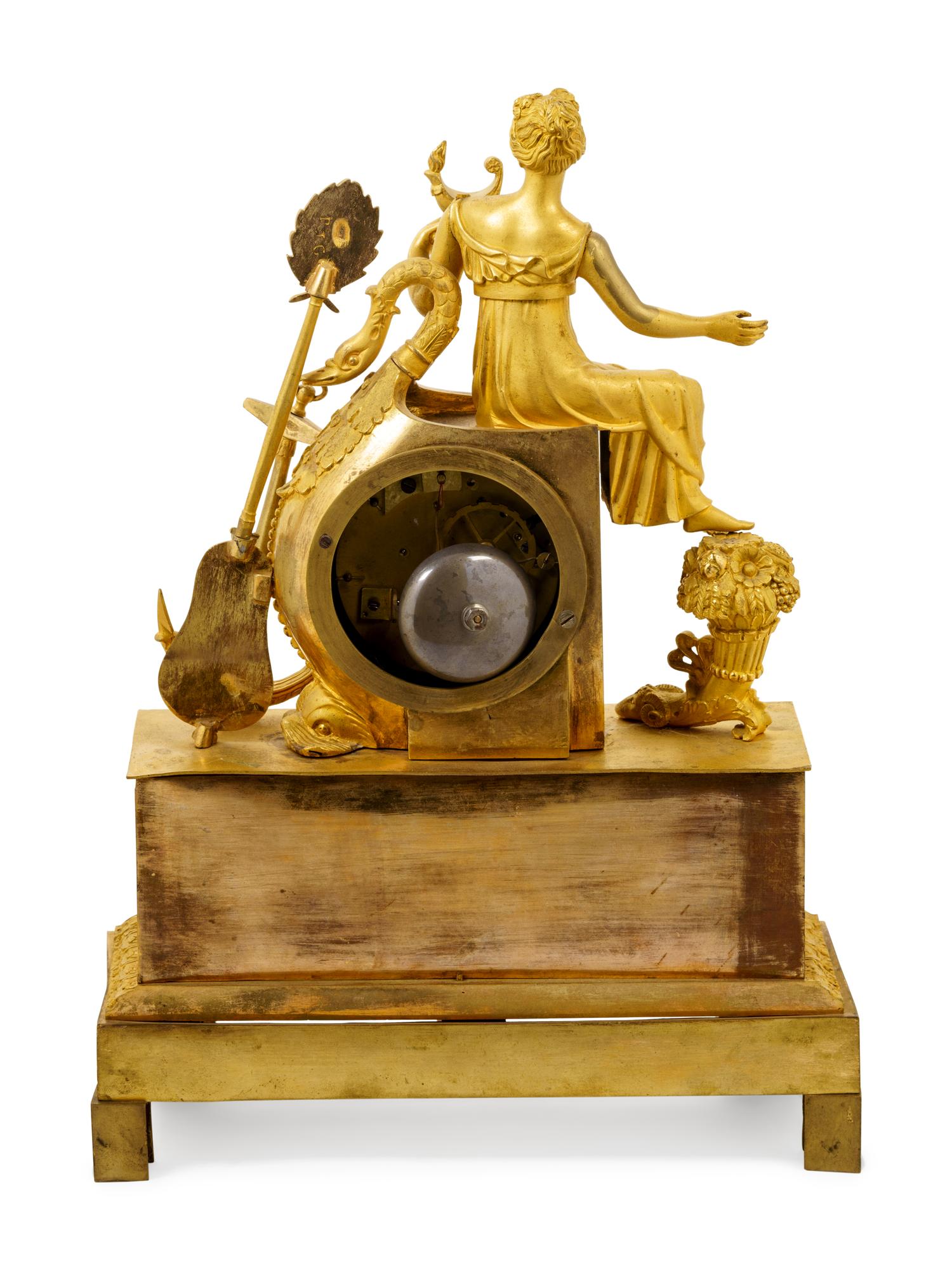 An Empire Gilt Bronze Figural Mantel Clock