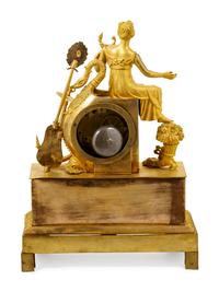 An Empire Gilt Bronze Figural Mantel Clock