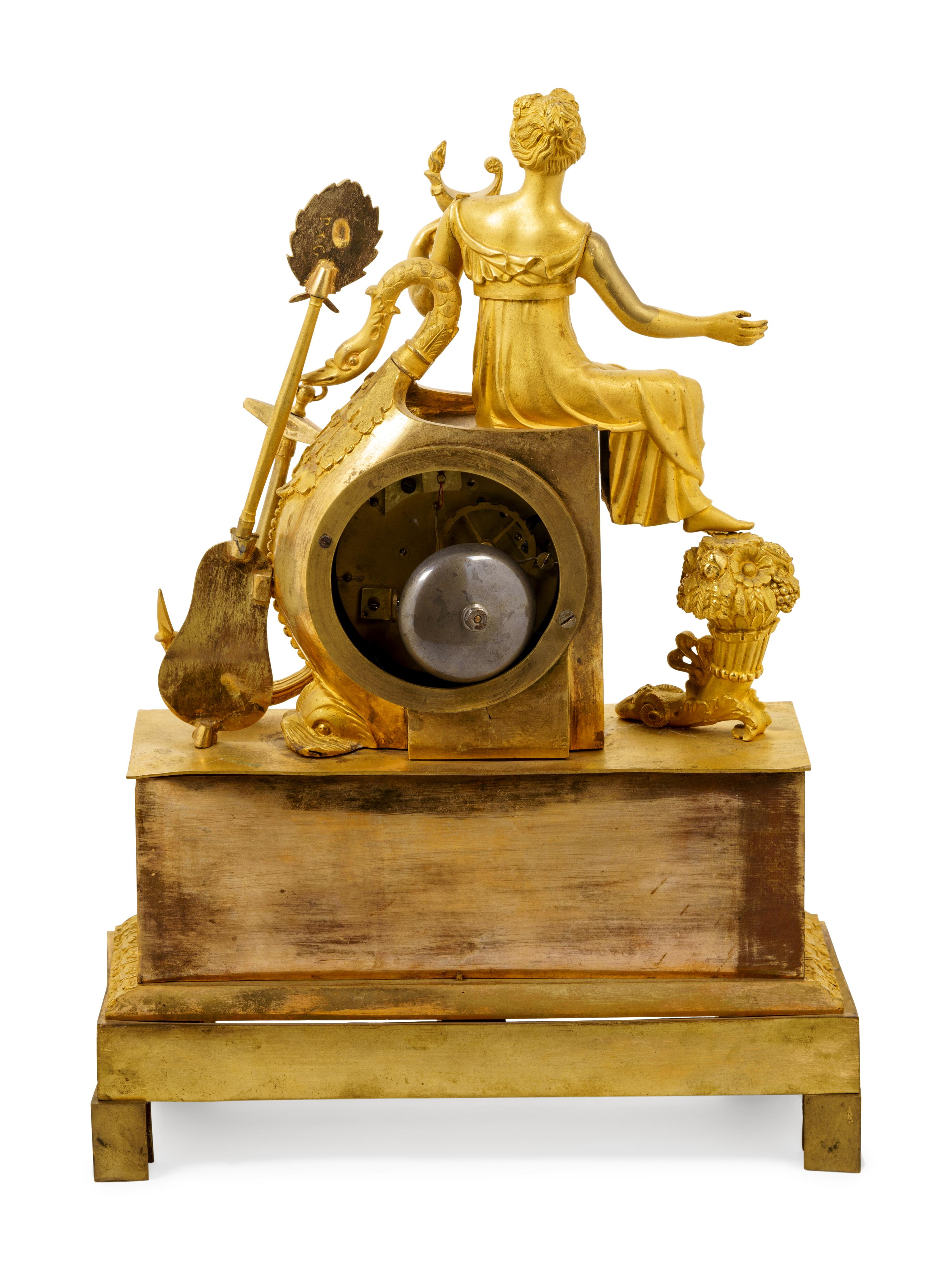 An Empire Gilt Bronze Figural Mantel Clock