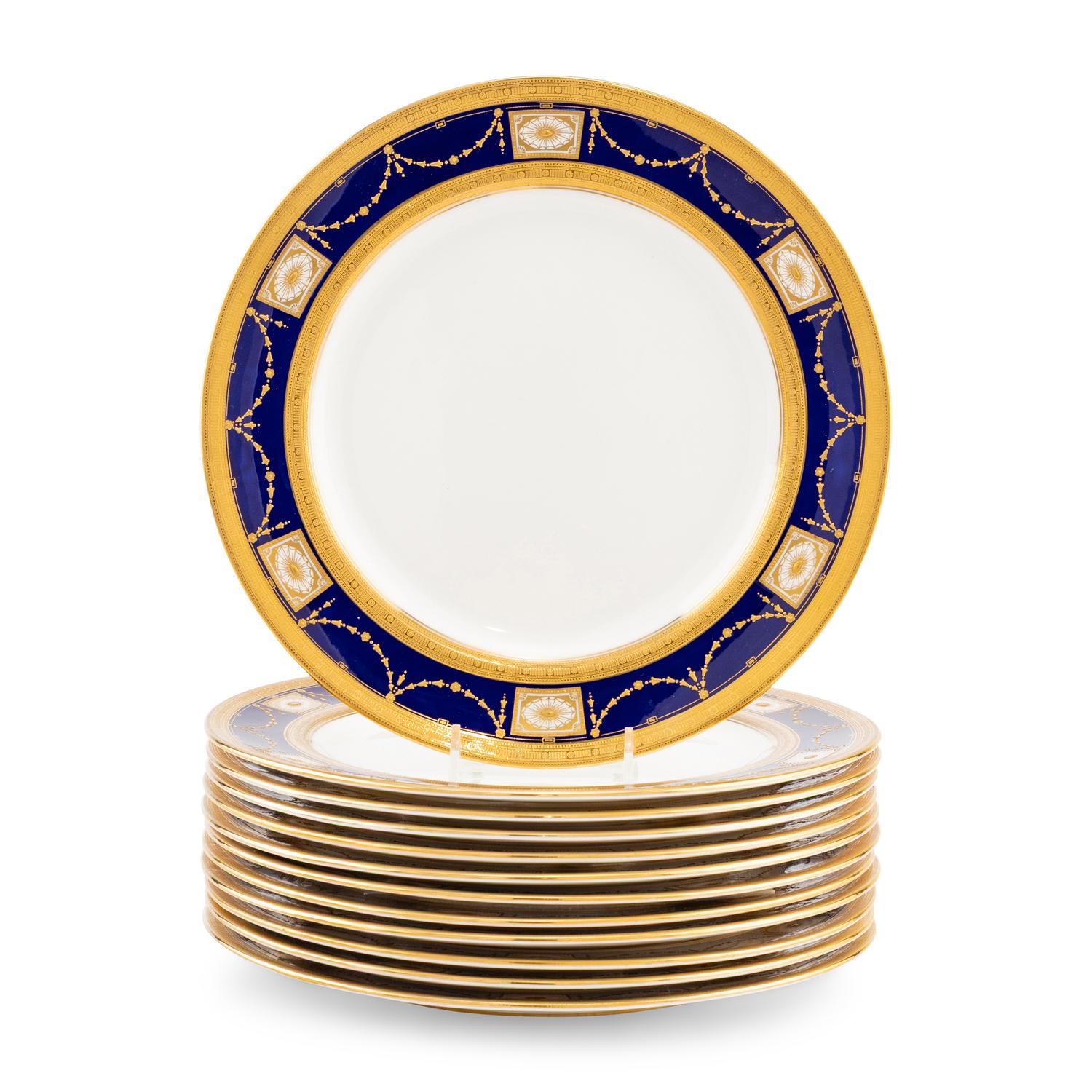 A Set of Twelve Royal Doulton Parcel Gilt Porcelain Dinner Plates