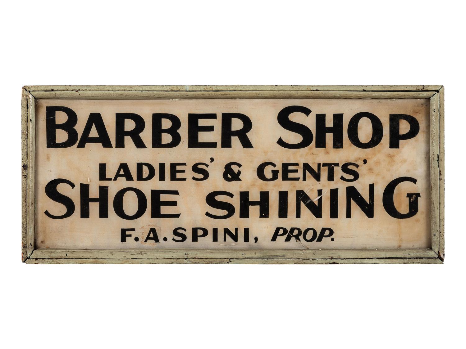 A Barber Shop Advertising Sign