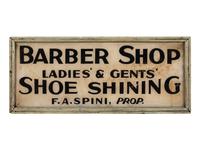 A Barber Shop Advertising Sign