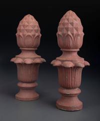 A Pair of Red Painted Cast Iron Architectural Finials