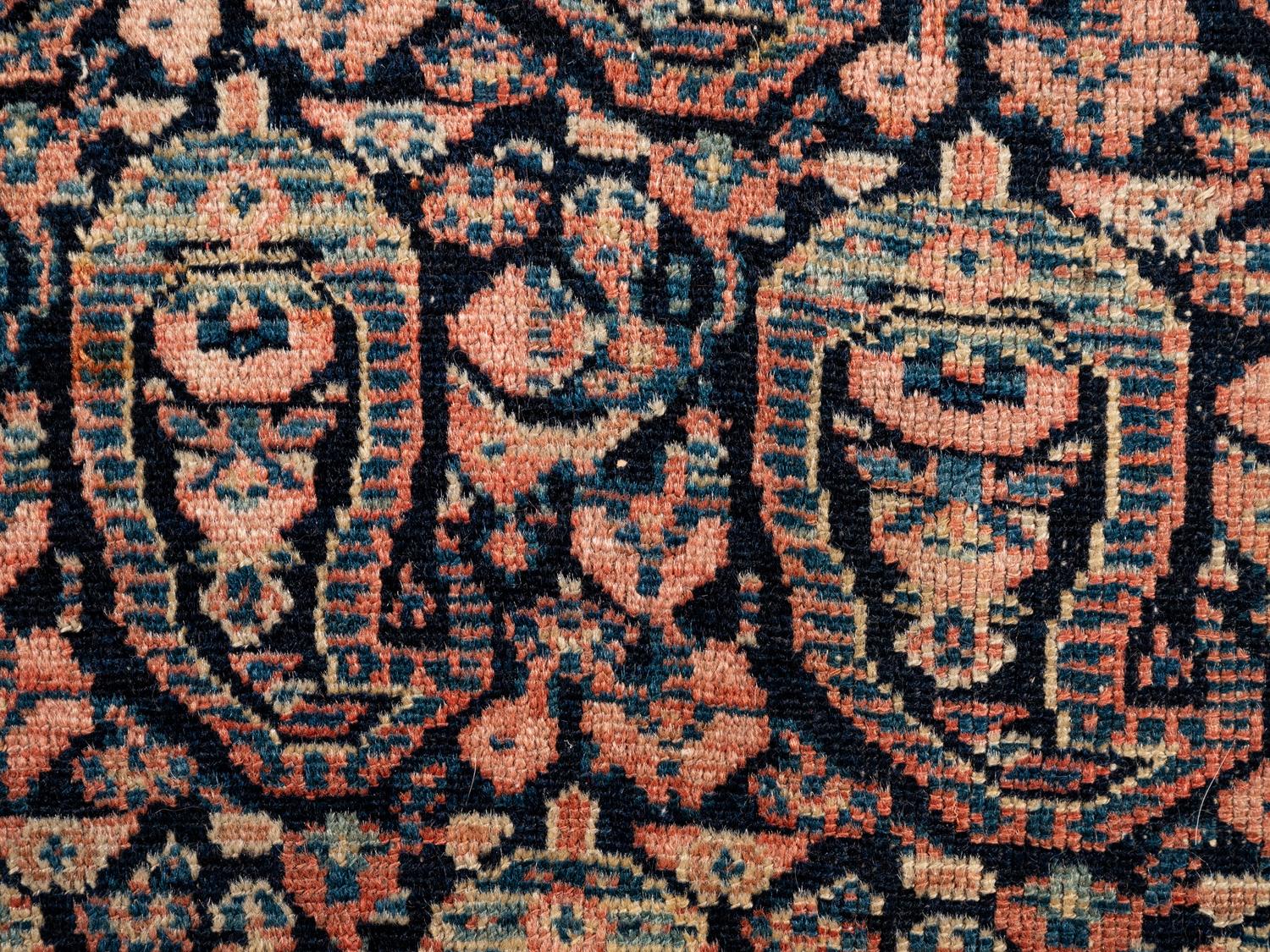 A Persian Senneh Wool Rug