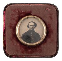 [CIVIL WAR]. A group of 3 tintypes of soldiers, incl. portrait of an armed soldier and portraits of soldier and wife housed in locket.