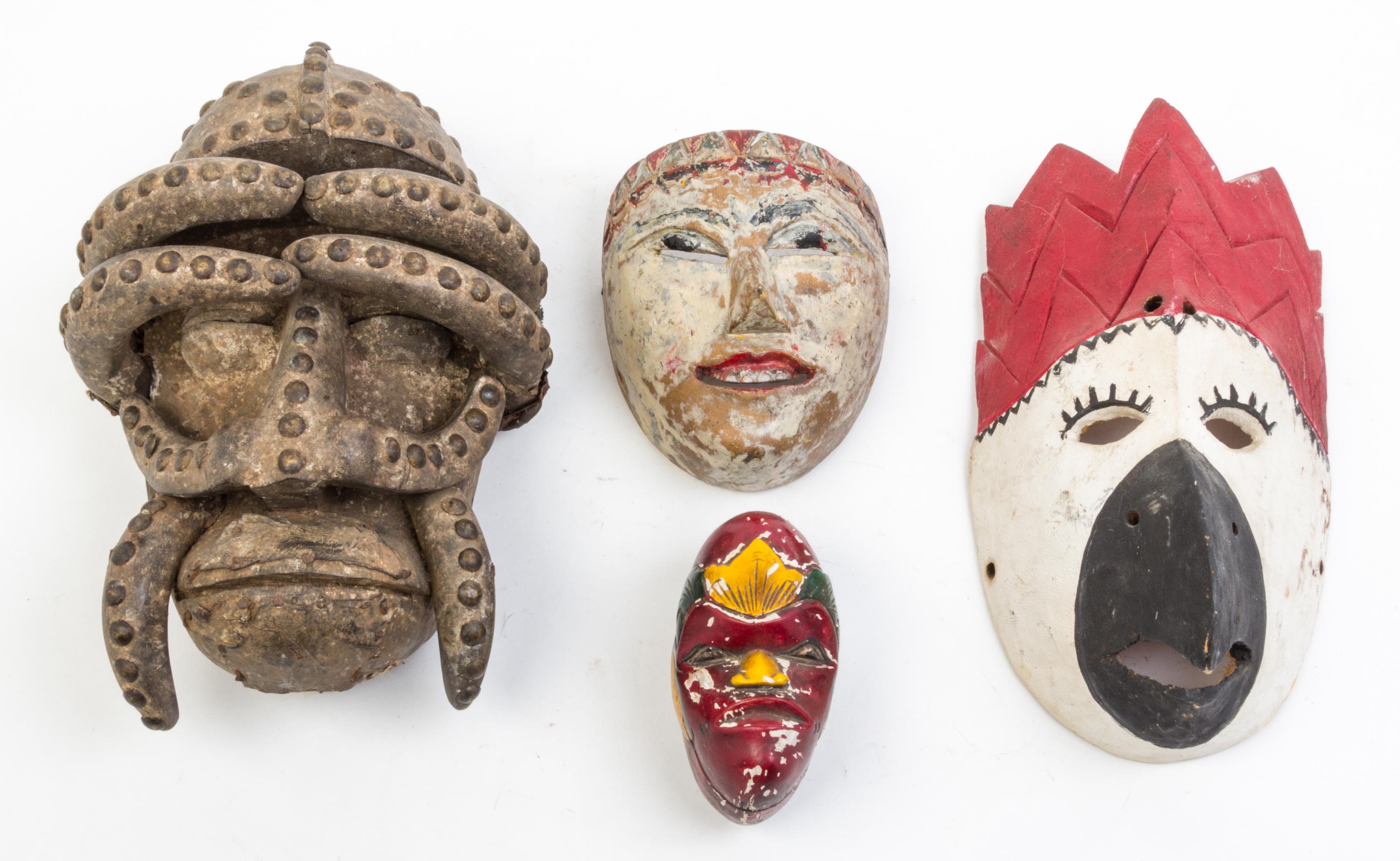 A Group of Five Masks Height of tallest 13 inches.