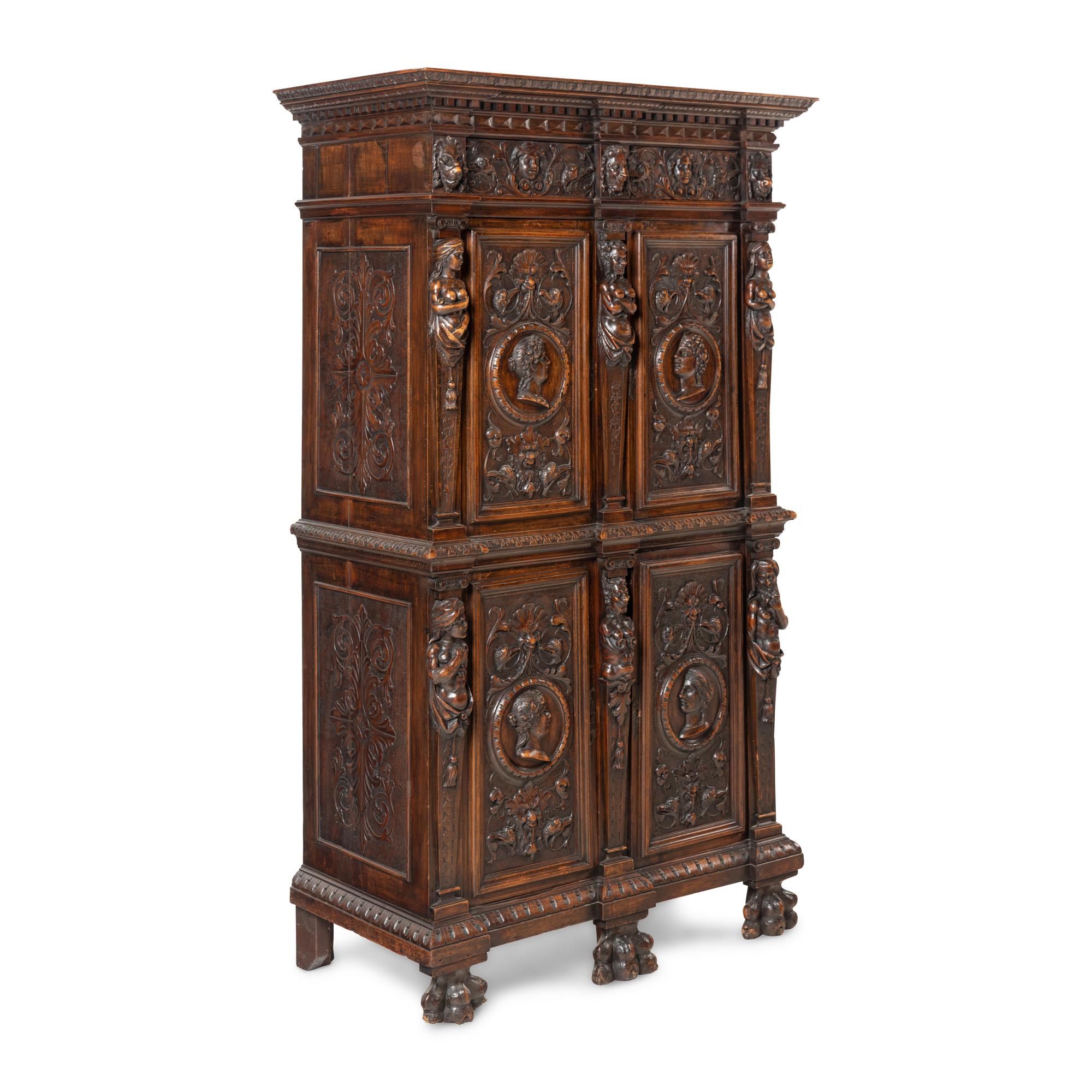 An Italian Renaissance Style Carved Walnut Cabinet