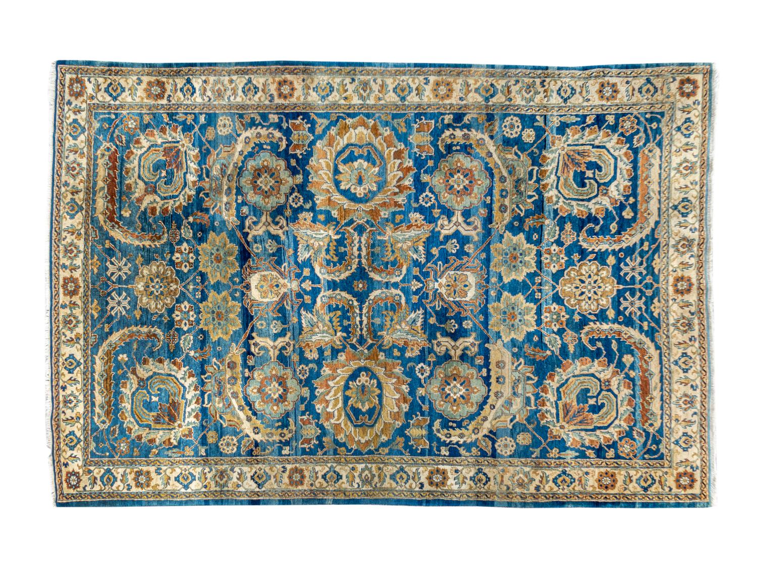 An Agra Wool Rug — 20TH CENTURY
