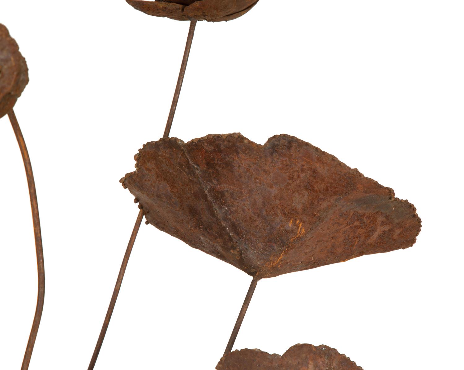 A Metal Multi-Headed Water Lily Sculpture