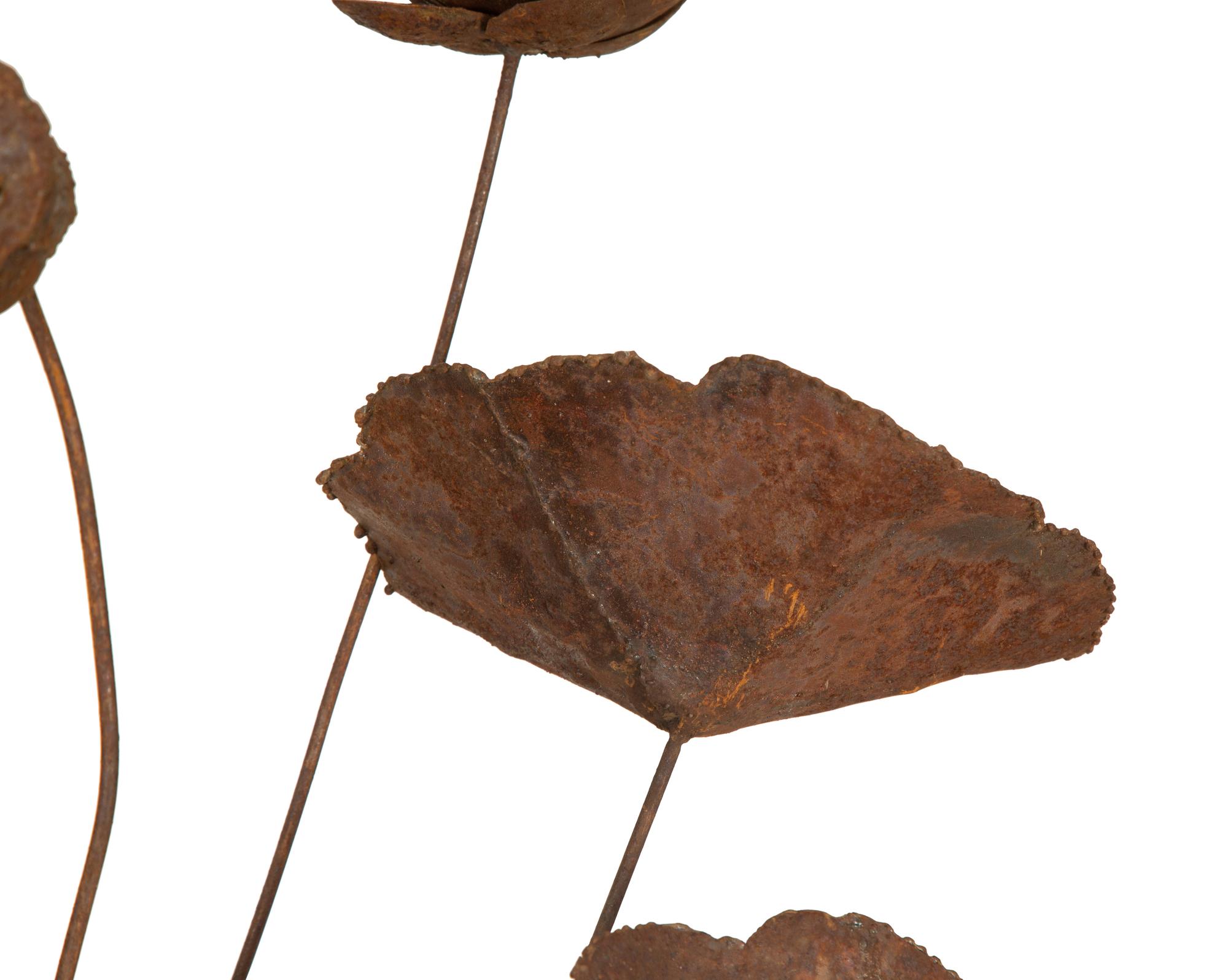 A Metal Multi-Headed Water Lily Sculpture