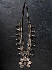 Navajo Silver, Turquoise, and Sugilite Squash Blossom Necklace