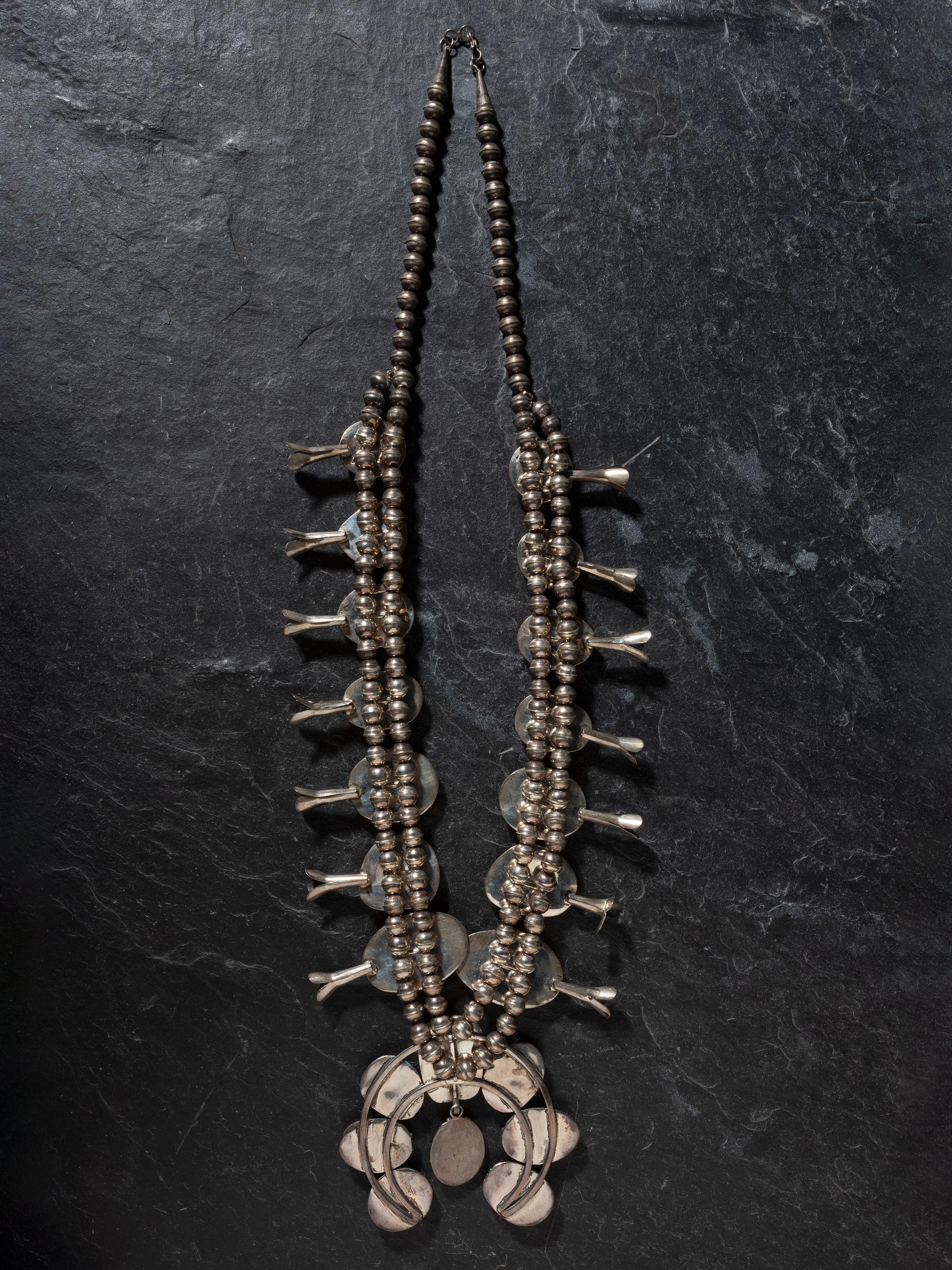 Navajo Silver, Turquoise, and Sugilite Squash Blossom Necklace