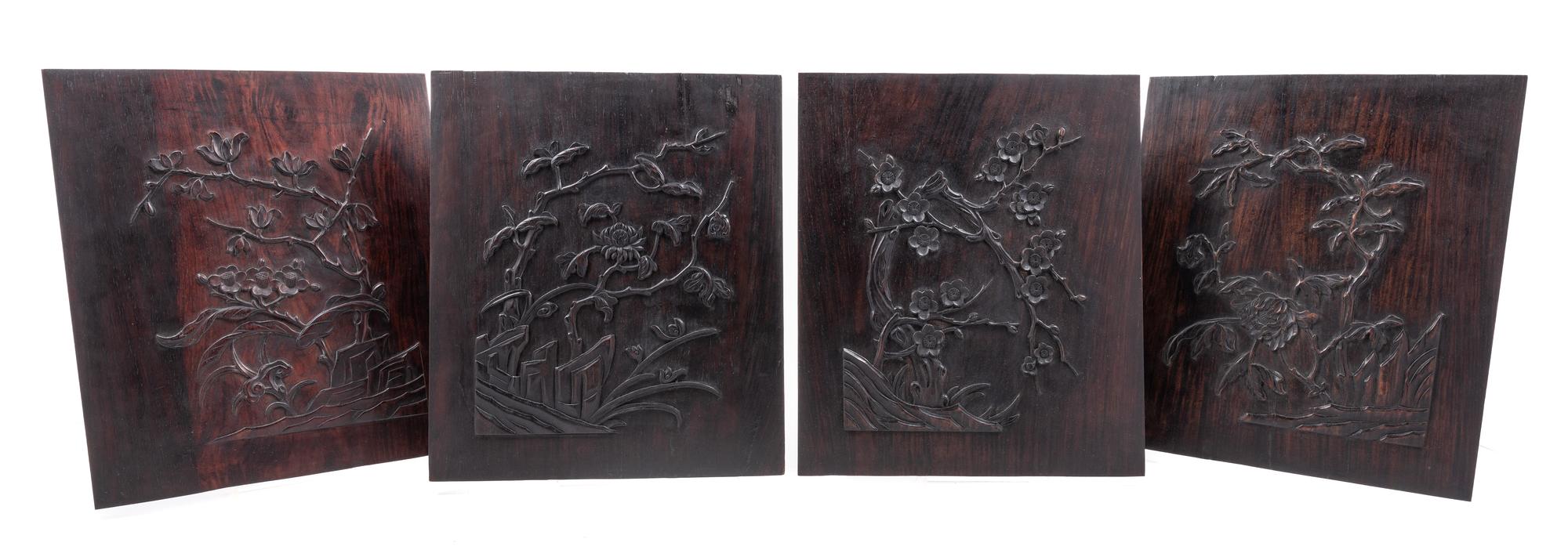 A Set of Four Chinese Zitan Wood 'Dragon' Panels