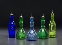 Five Green and Cobalt 'Mary Gregory' Glass Barber Bottles
